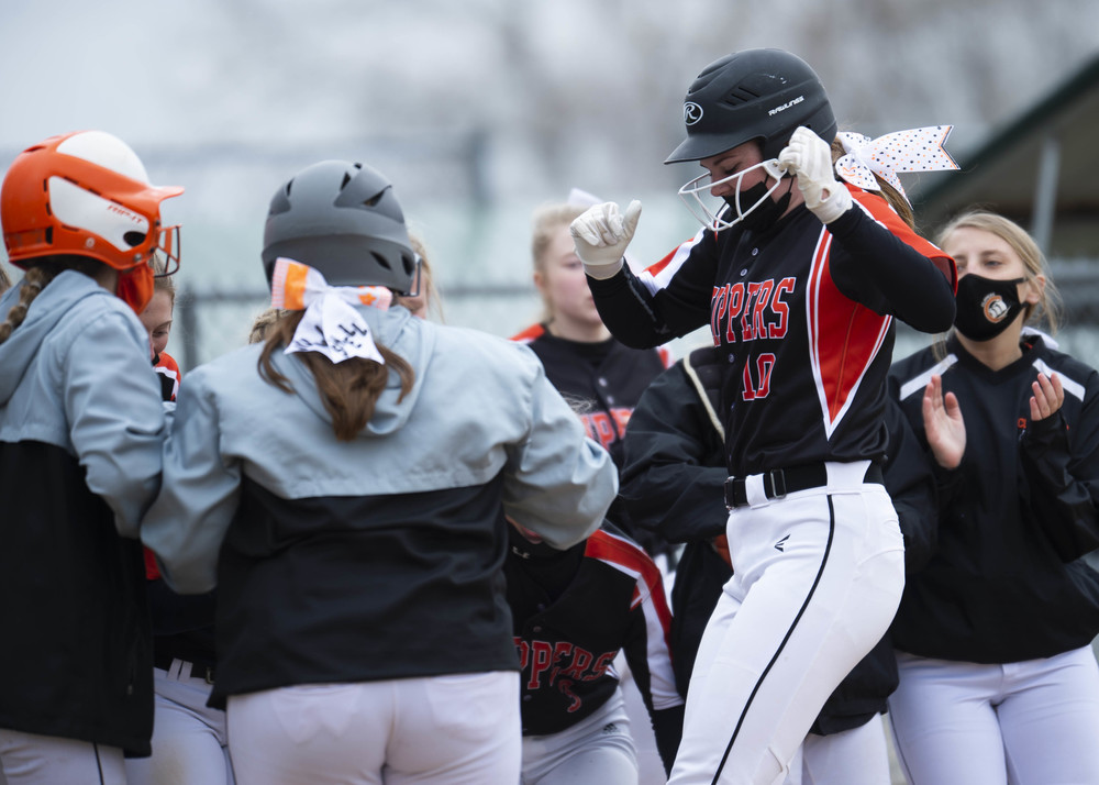 Varsity girls fall twice on opening day