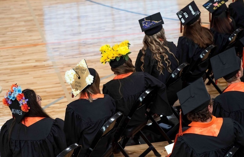 Graduates with decorated hats